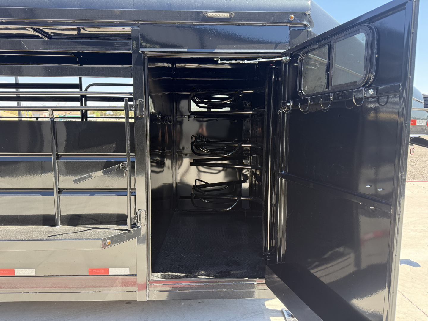 New 2026 Delco 6'8"x28' GN Metal Top Livestock Trailer - MC Cowboy Deluxe