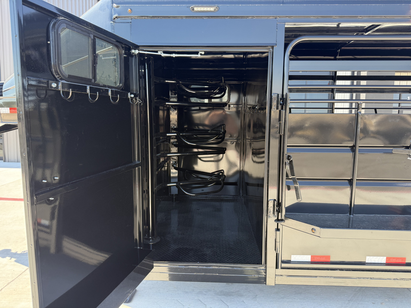 New 2026 Delco 6'8"x28' GN Metal Top Livestock Trailer - MC Cowboy Deluxe