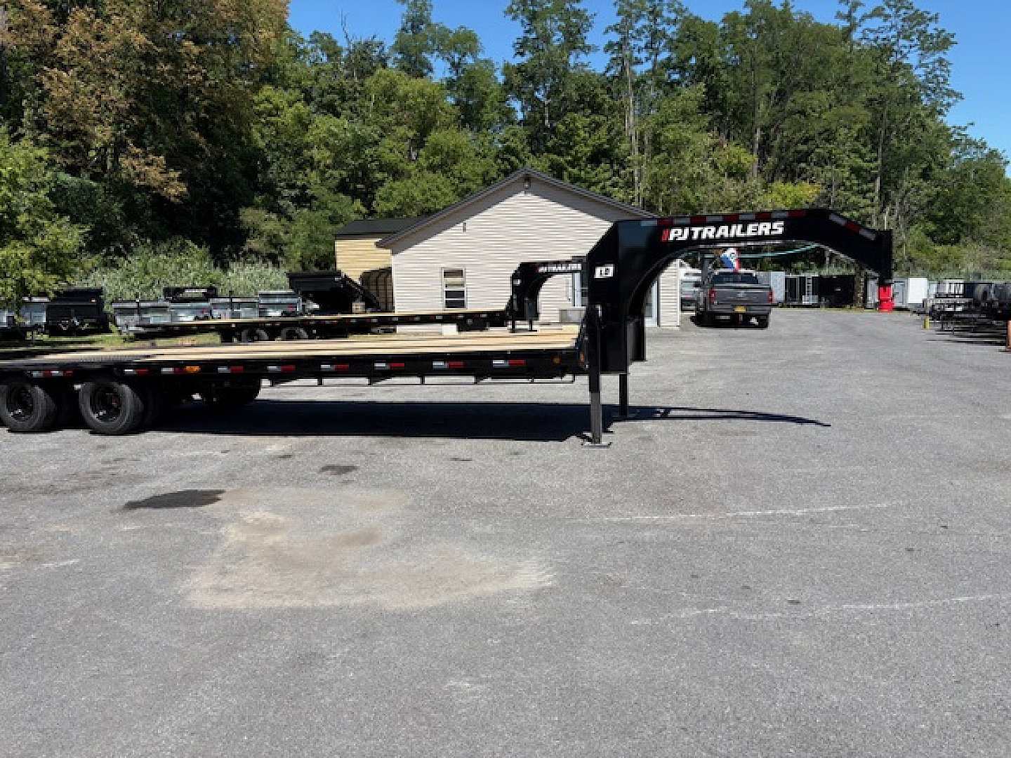 New 2023 PJ TRAILERS 102" x 30' LD Flatbed Trailer