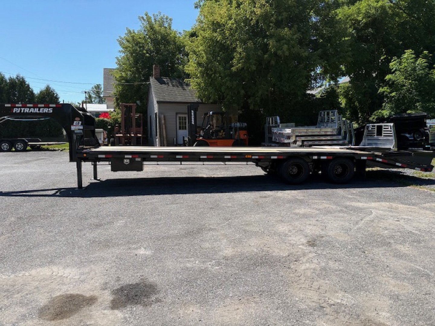 New 2023 PJ TRAILERS 102" x 30' LD Flatbed Trailer