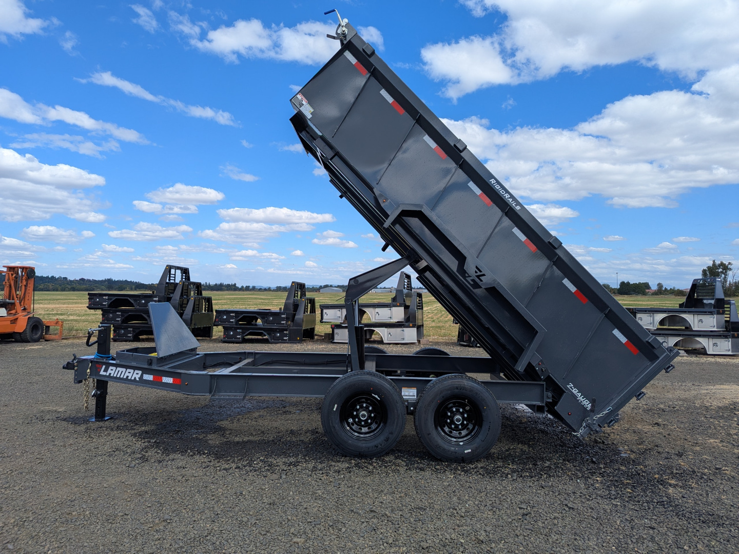 New 2025 LAMAR TRAILERS 83" x 14' - 14K Dump Trailer 36" SDIES