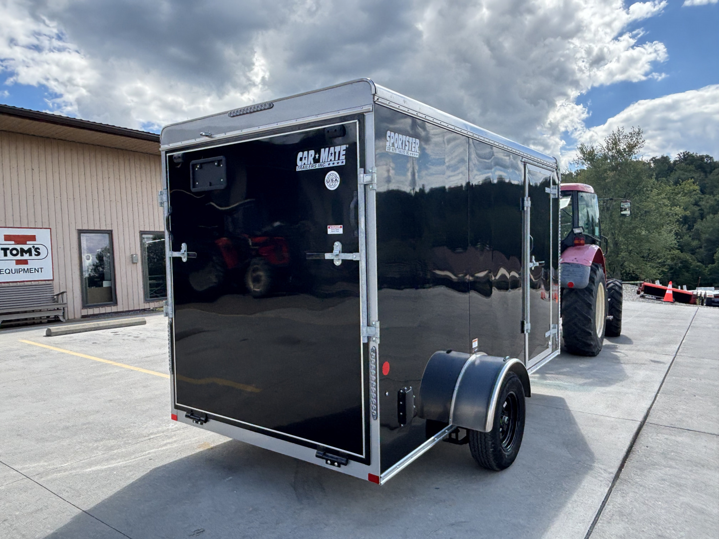 New 2025 Car Mate Trailers 6x12 Sportster Enclosed Trailer - Black w/ Ramp - 2990# GVWR