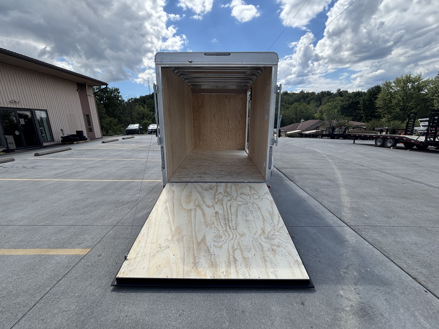 New 2025 Car Mate Trailers 6x12 Sportster Enclosed Trailer - Black w/ Ramp - 2990# GVWR