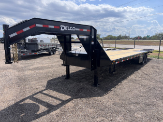 New 2026 Delco Trailers 102x32ft Gooseneck Flatbed Hydraulic Dovetail