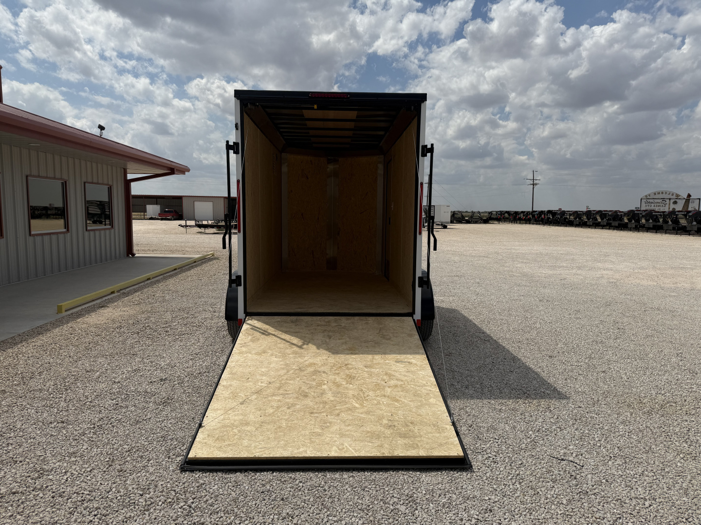 New 2026 Compass 6'x12' Enclosed Cargo Trailer - Indigo DLX