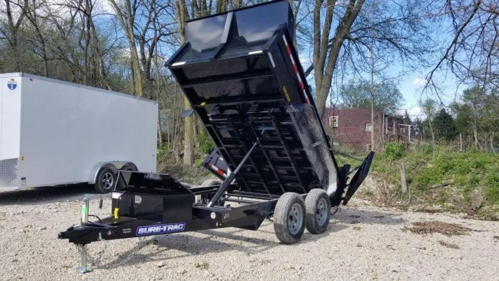 New 2026 Sure-Trac 6x10 Single Ram Low Pro Dump Trailer