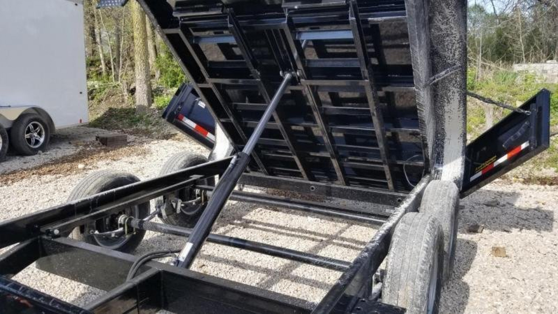 New 2026 Sure-Trac 6x10 Single Ram Low Pro Dump Trailer