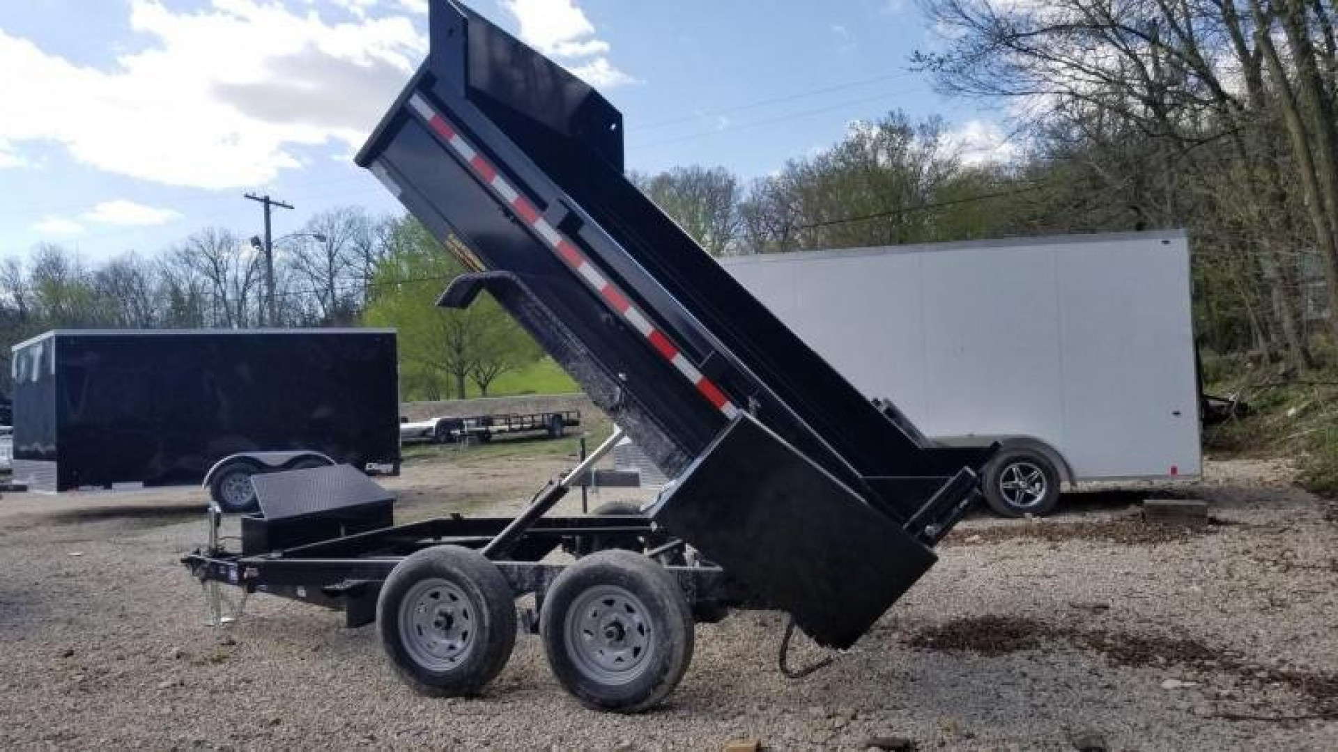 New 2026 Sure-Trac 6x10 Single Ram Low Pro Dump Trailer