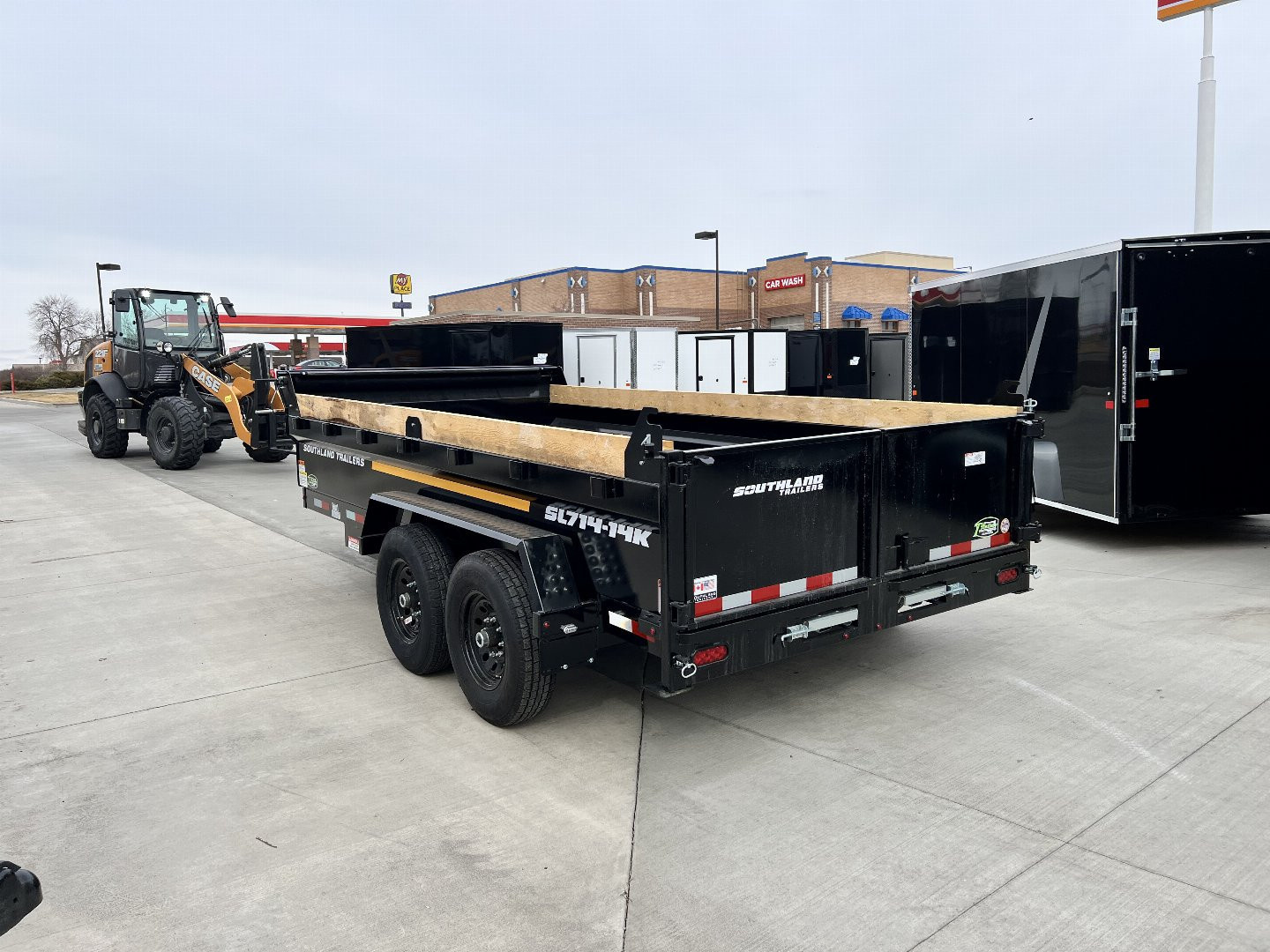 Used Twice 2026 Southland 14ft Low Profile Dump Trailer 2-7000 lb axles =14K with Ramps
