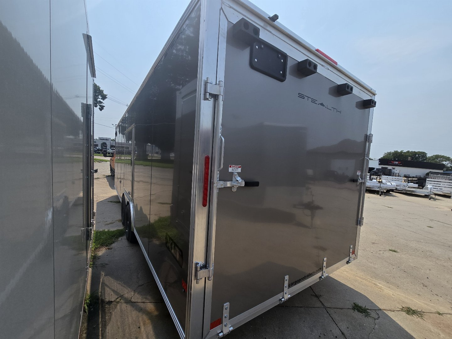 New 2026 ALCOM 8.5x24 XLT 10k GVWR-4x4 side door Cargo / Enclosed Trailer