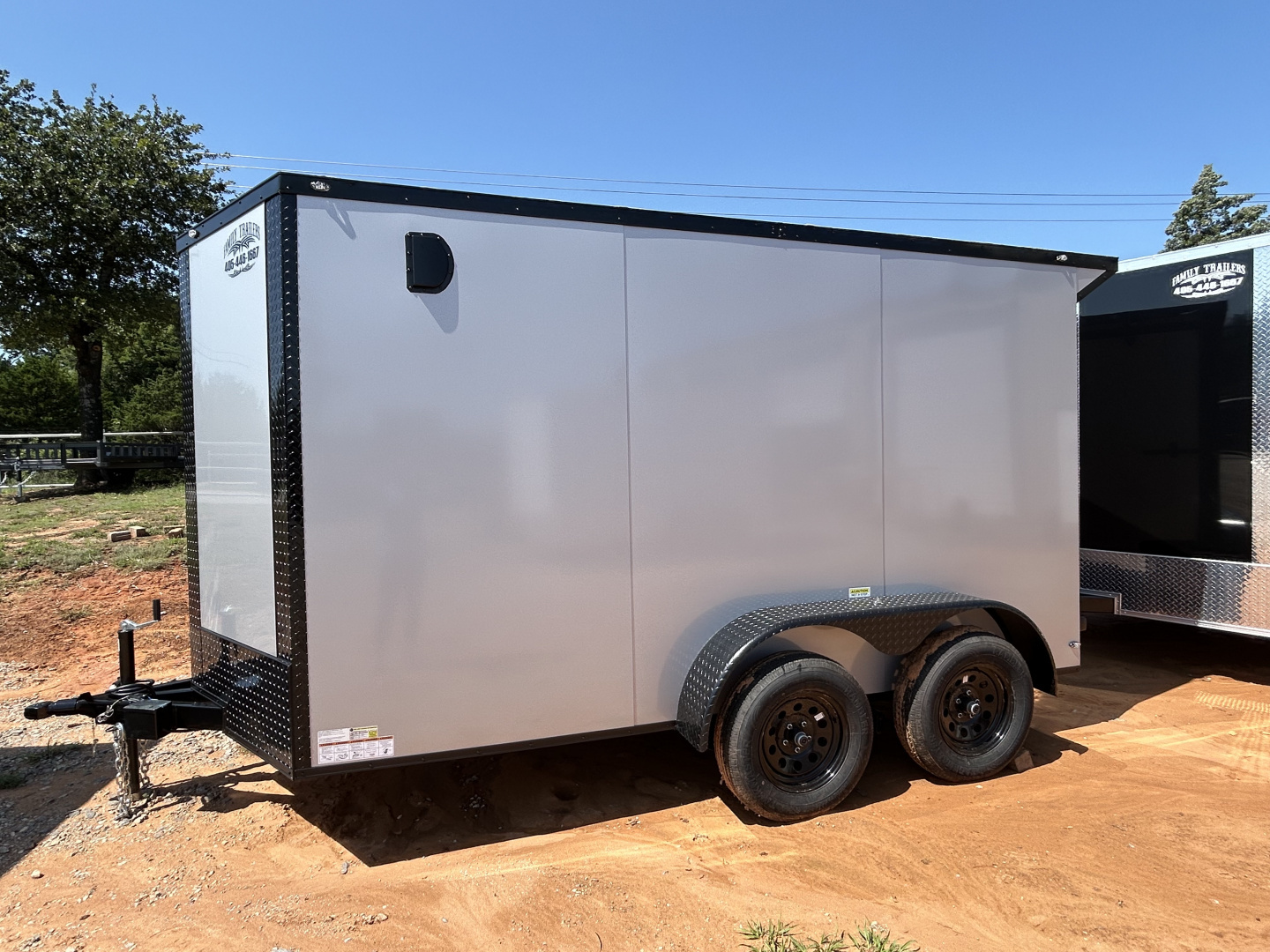 New 2025 Family Trailer 6x12 Tandem Axles Cargo / Enclosed Trailer- Screwless Exterior-Blackout pkg.-Rear Spoiler