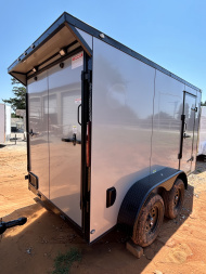 New 2025 Family Trailer 6x12 Tandem Axles Cargo / Enclosed Trailer- Screwless Exterior-Blackout pkg.-Rear Spoiler