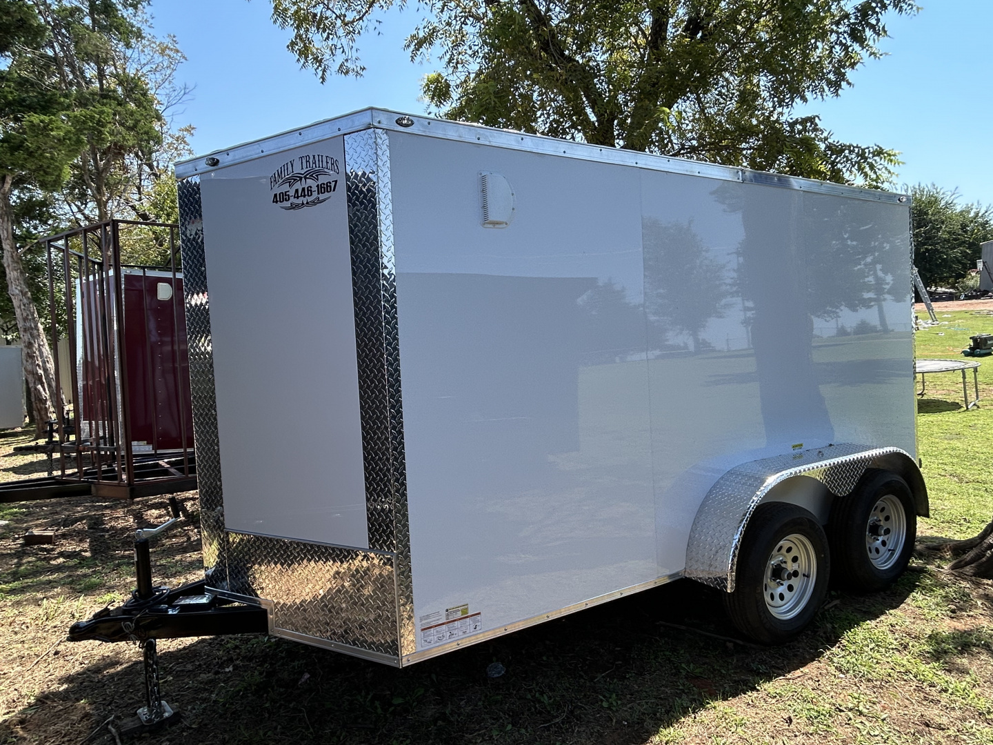 New 2025 Family Trailer 6x12 Tandem Axles Cargo / Enclose d Trailer-Screwless Exterior-Basic Pkg.