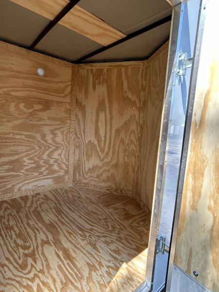 New 2025 Family Trailer 6x12 Tandem Axles Cargo / Enclose d Trailer-Screwless Exterior-Basic Pkg.