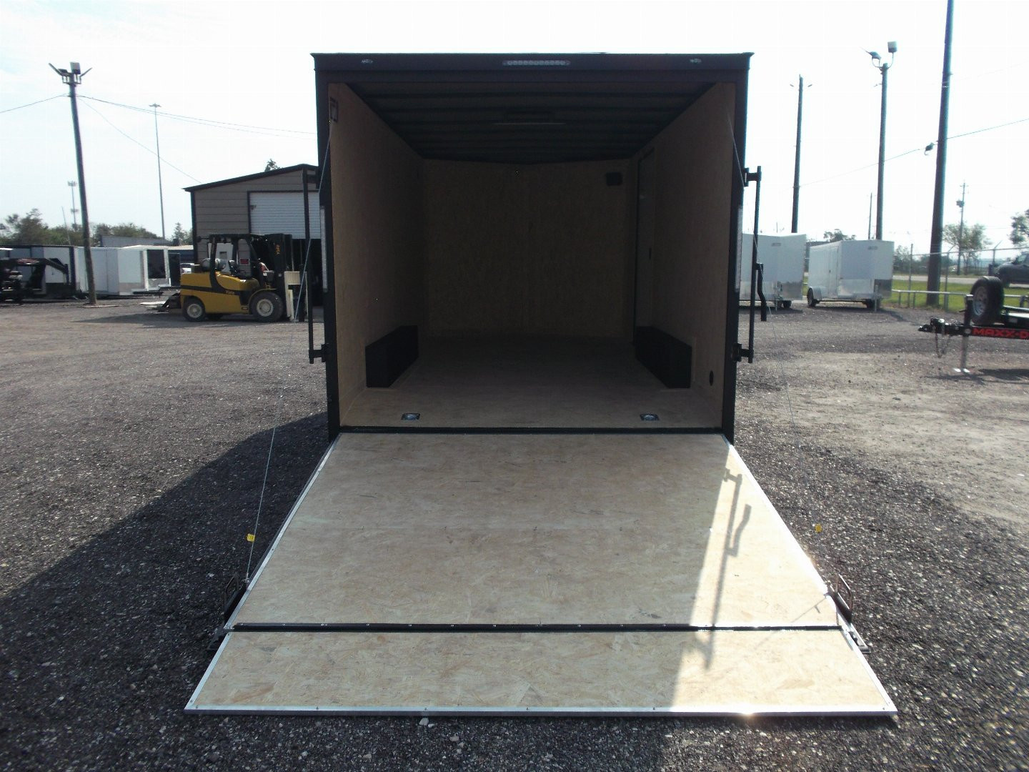 New 2026 Covered Wagon Trailers 8.5x16 Cargo Trailer / Car Hauler / 5200# Axles / 7ft Interior Height / 48" RV Side Door / Bed Lined RV Step / .030 Silver Semi-Screwless Exterior / 60" Triple Tube Tongue / Extra Wide Ramp / Black Out Package