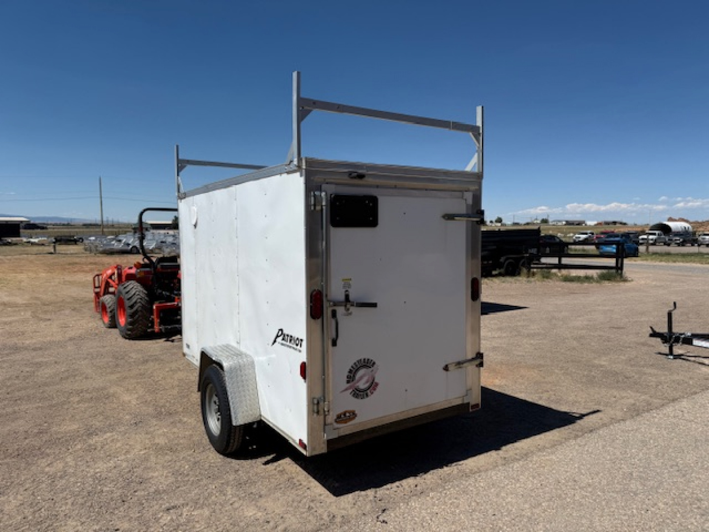 Used 2015 Homesteader Patriot Contractor Trailer 5x10 w/ shelves- rear swing door
