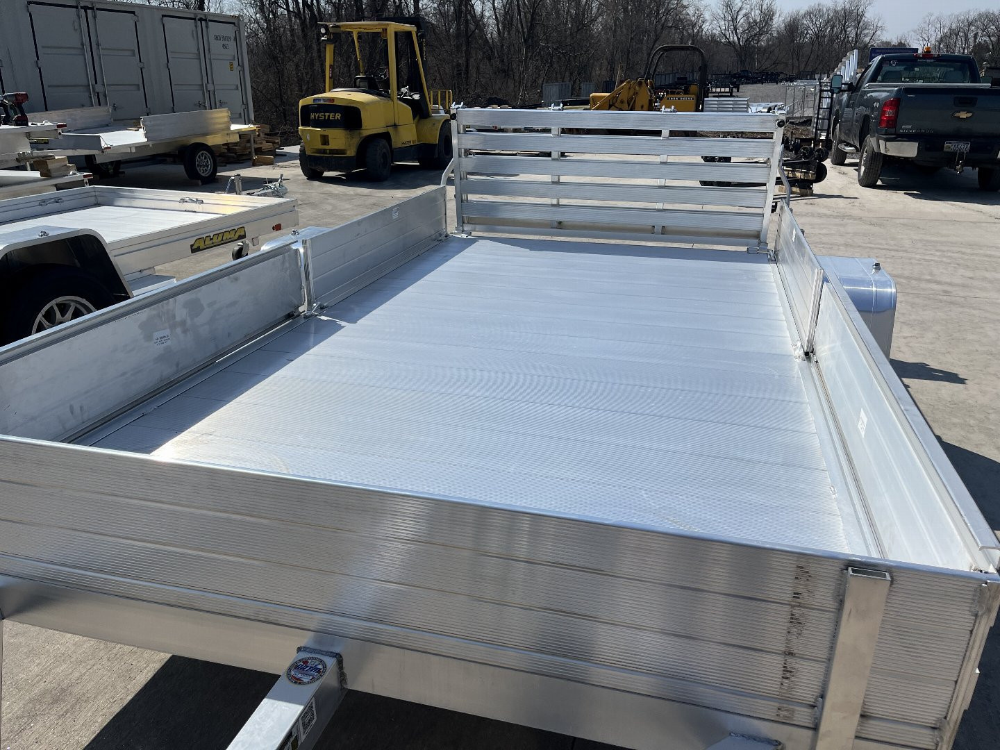 New 2026 Aluma 8112SR ATV/Utility Trailer - Solid Side w/ Side Load Ramps- Bi-Fold Gate