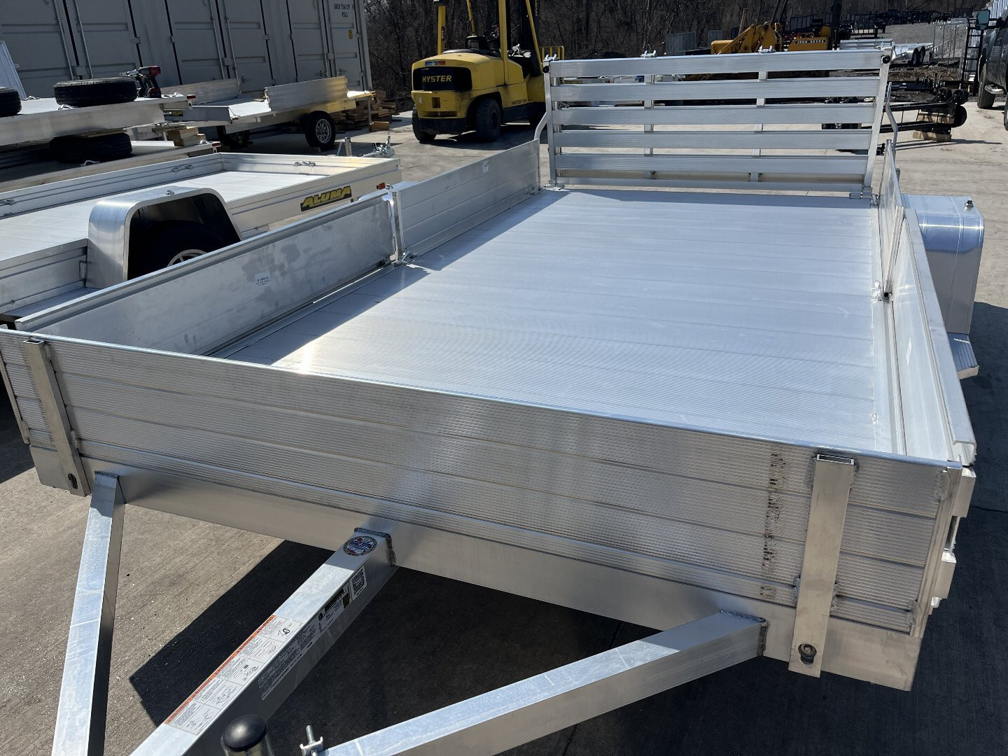 New 2026 Aluma 8112SR ATV/Utility Trailer - Solid Side w/ Side Load Ramps- Bi-Fold Gate