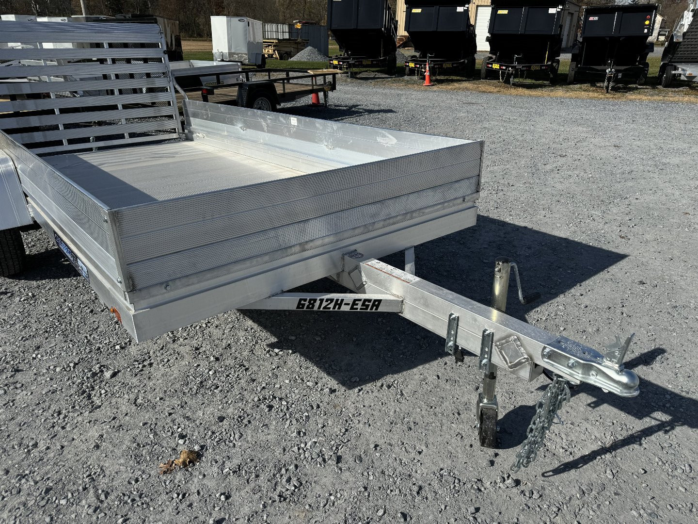 New 2026 Aluma 6812H-ESA-S-TG One Foot Sides, One Piece Gate Utility Trailer