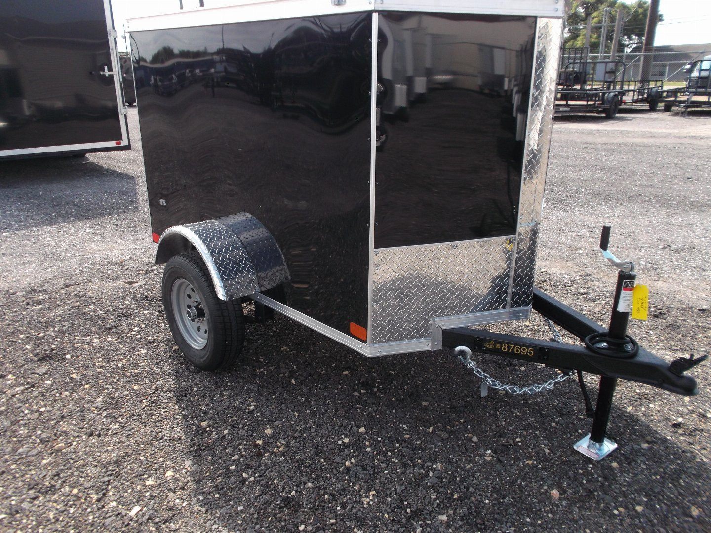 New 2026 Covered Wagon Trailers 4x6 Single Axle Cargo Trailer / Enclosed Trailer / LEDs / .030 Black Semi-Screwless Exterior / Bed Lined Frame and Tongue