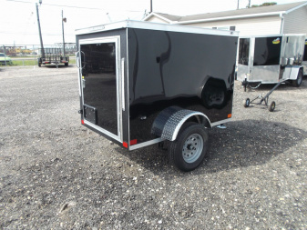 New 2026 Covered Wagon Trailers 4x6 Single Axle Cargo Trailer / Enclosed Trailer / LEDs / .030 Black Semi-Screwless Exterior / Bed Lined Frame and Tongue