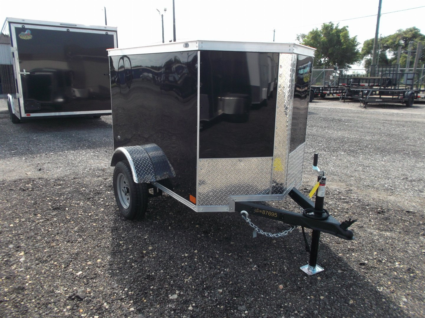 New 2026 Covered Wagon Trailers 4x6 Single Axle Cargo Trailer / Enclosed Trailer / LEDs / .030 Black Semi-Screwless Exterior / Bed Lined Frame and Tongue