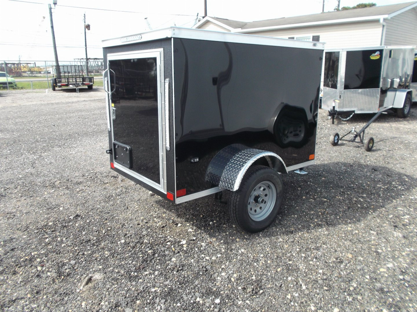 New 2026 Covered Wagon Trailers 4x6 Single Axle Cargo Trailer / Enclosed Trailer / LEDs / .030 Black Semi-Screwless Exterior / Bed Lined Frame and Tongue