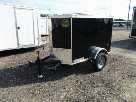 New 2026 Covered Wagon Trailers 4x6 Single Axle Cargo Trailer / Enclosed Trailer / LEDs / .030 Black Semi-Screwless Exterior / Bed Lined Frame and Tongue