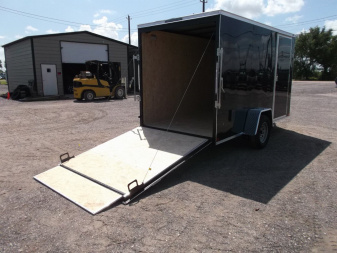 New 2026 Covered Wagon Trailers 6x12 Cargo / Enclosed Trailer / Extra Wide Ramp / 36" RV Side Door / 6'6" Interior / Bed Lined Tongue and Frame / (4) D-Rings / .030 Black Semi-Screwless Exterior
