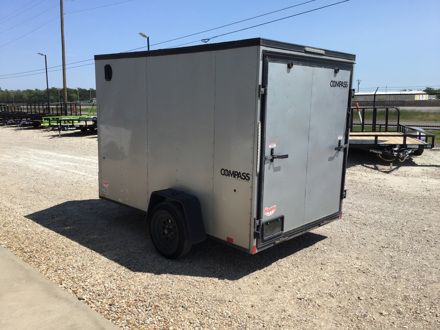 Used 2023 Compass 6'x10' Enclosed Trailer- Indigo