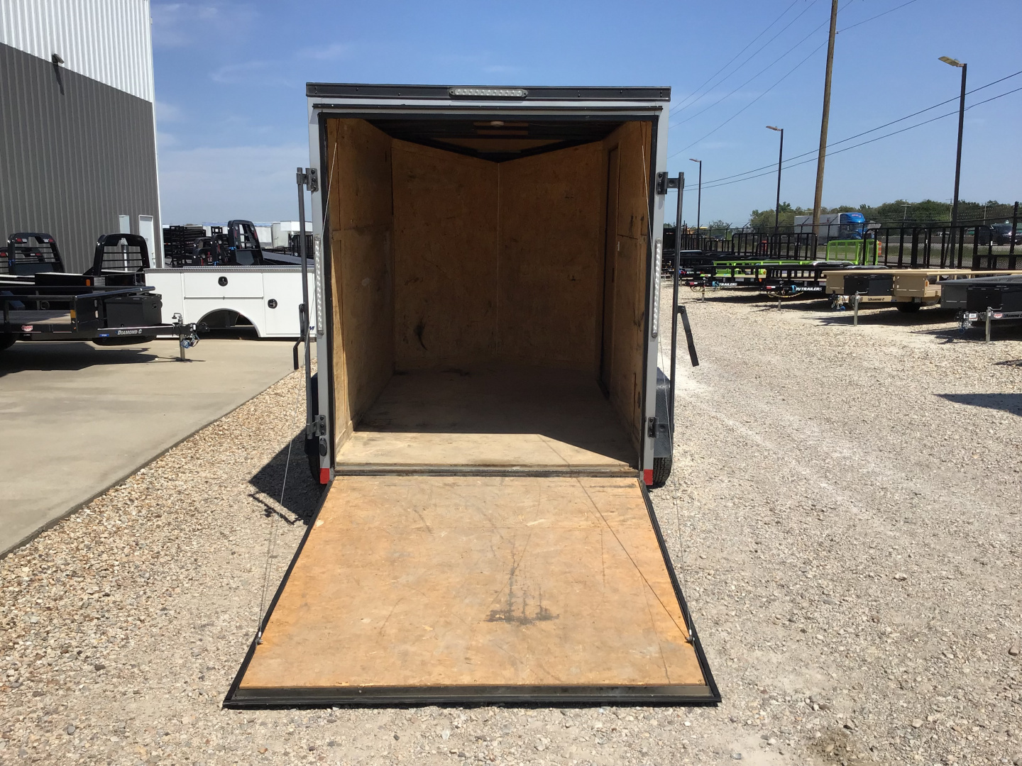 Used 2023 Compass 6'x10' Enclosed Trailer- Indigo