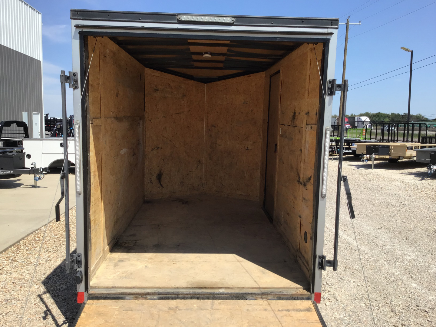 Used 2023 Compass 6'x10' Enclosed Trailer- Indigo