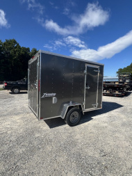 New 2025 Homesteader Trailer / 610IS Cargo / Enclosed Trailer / 6'6  Interior Height / Charcoal Gray in color / Side Door w/ RV Door Lock and Ramp Rear Door