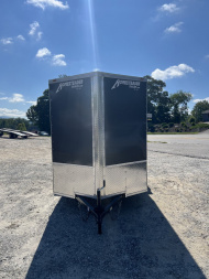 New 2025 Homesteader Trailer / 610IS Cargo / Enclosed Trailer / 6'6" Interior Height / Charcoal Gray in color / Side Door w/ RV Door Lock and Ramp Rear Door