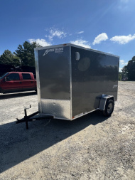 New 2025 Homesteader Trailer / 610IS Cargo / Enclosed Trailer / 6'6" Interior Height / Charcoal Gray in color / Side Door w/ RV Door Lock and Ramp Rear Door