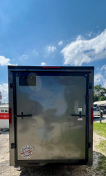 New 2026 HOMESTEADER TRAILER / INTREPID SERIES / 6' WIDE X 10' LONG / 6'6" INTERIOR HEIGHT / .030 CHARCOAL GRAY ALUMINUM W/ BLACK OUT PKG / 32" SIDE DOOR W/ RV LOCK / RAMP REAR DOOR / 4-D RINGS / 16" O/C WALL POST