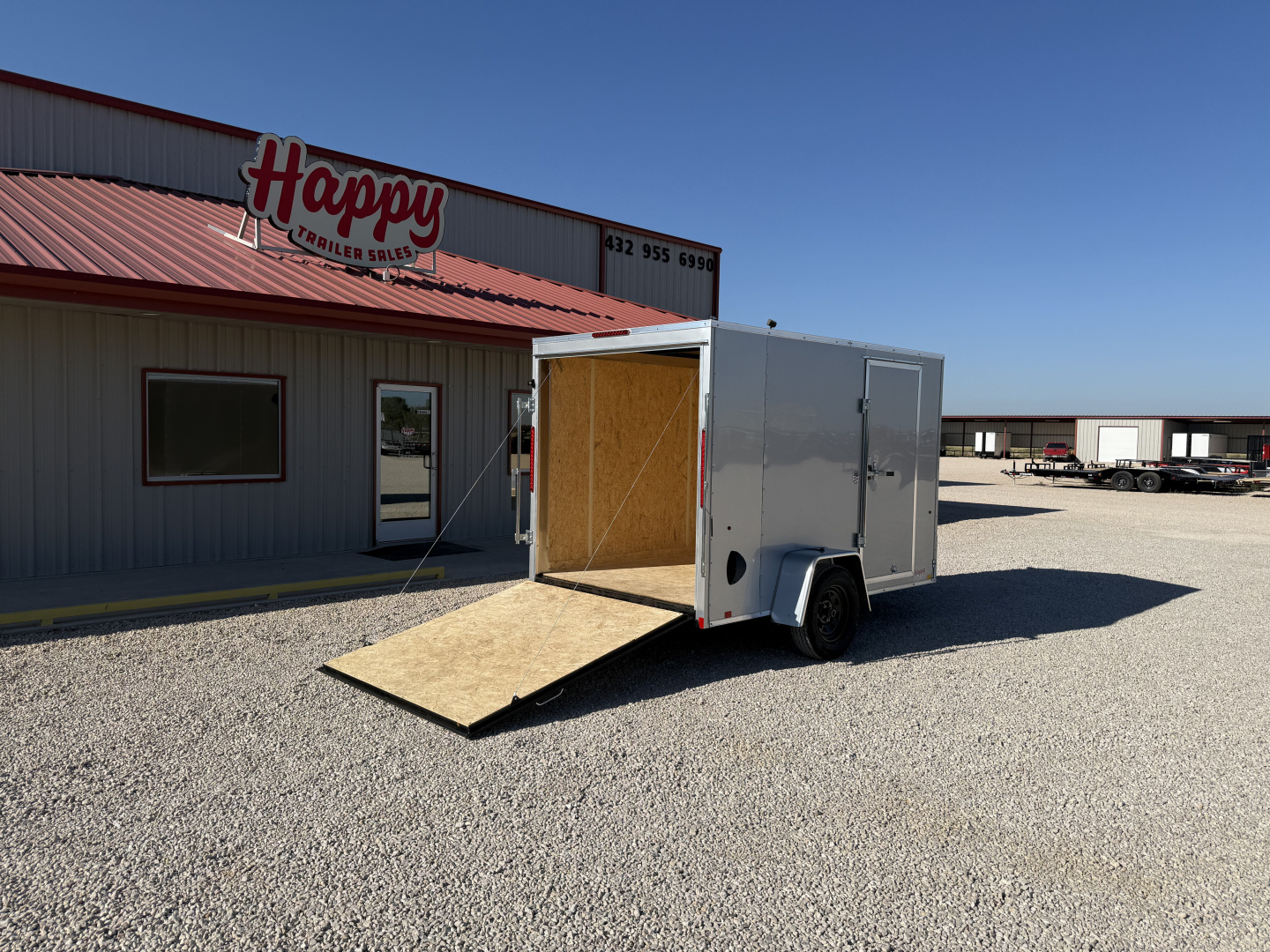 New 2026 Compass 6'x10' Enclosed Cargo Trailer - Indigo DLX