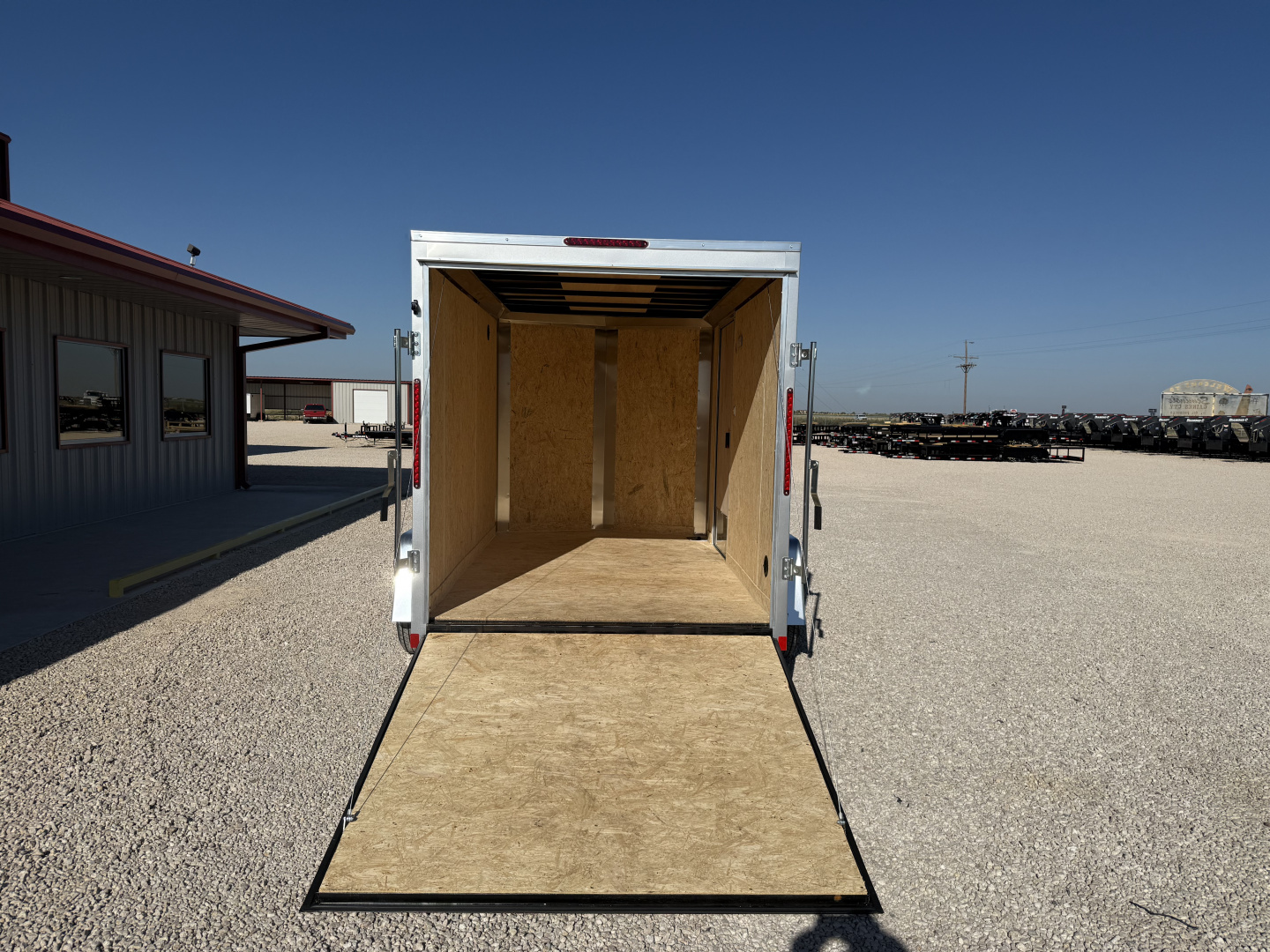 New 2026 Compass 6'x10' Enclosed Cargo Trailer - Indigo DLX