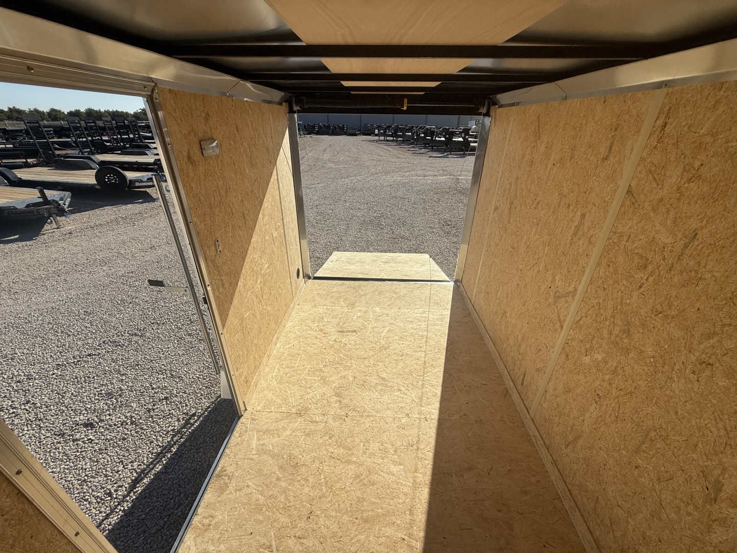 New 2026 Compass 6'x10' Enclosed Cargo Trailer - Indigo DLX