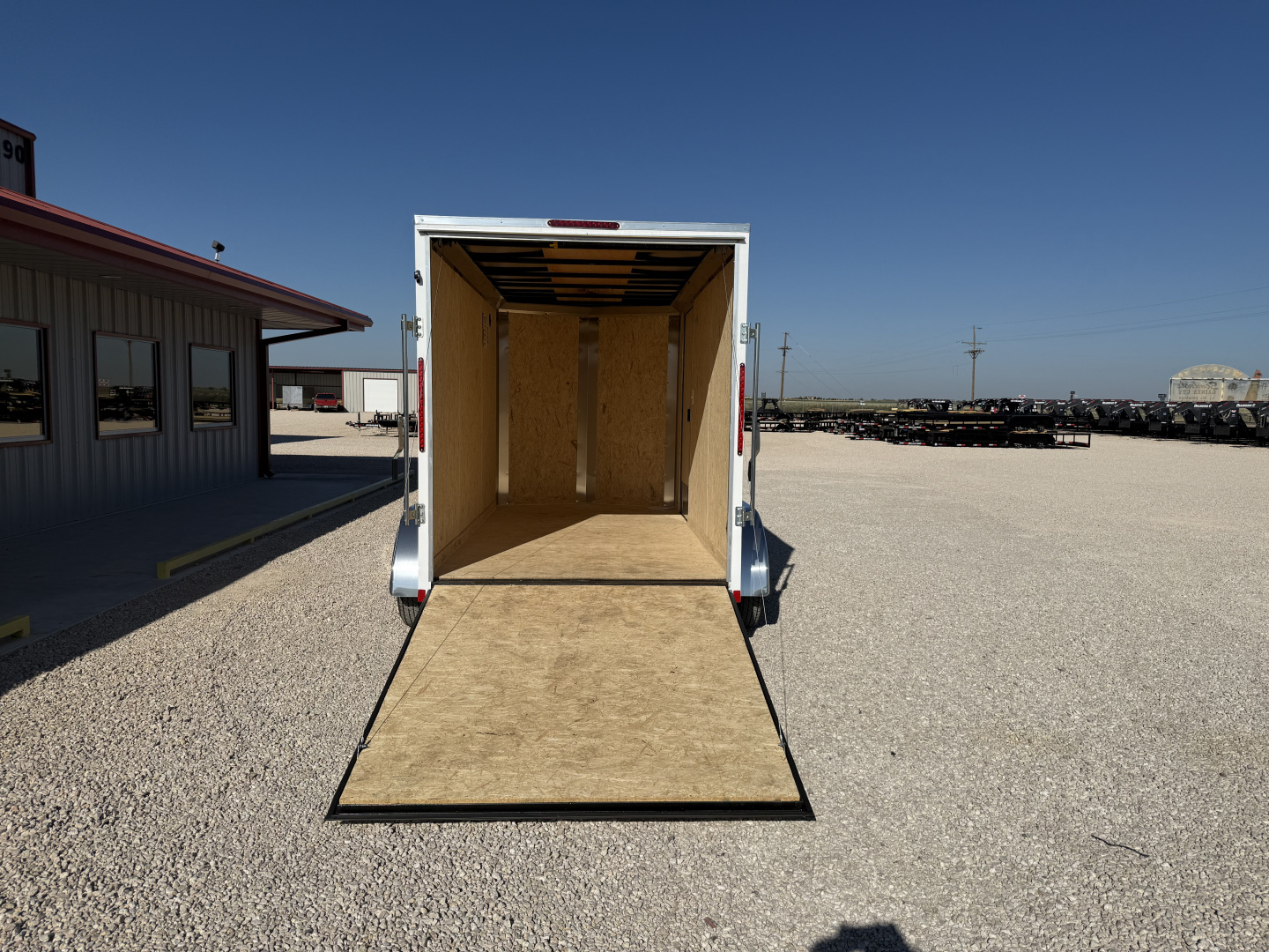 New 2026 Compass 6'x12' Enclosed Cargo Trailer - Indigo DLX