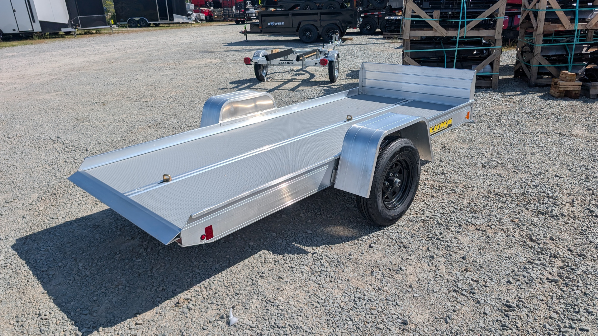 New 2026 Aluma 4'2" x 10 Tilt & GO Adventure Trailer (Snowmobiles, ATVs, Golf Carts!!!)