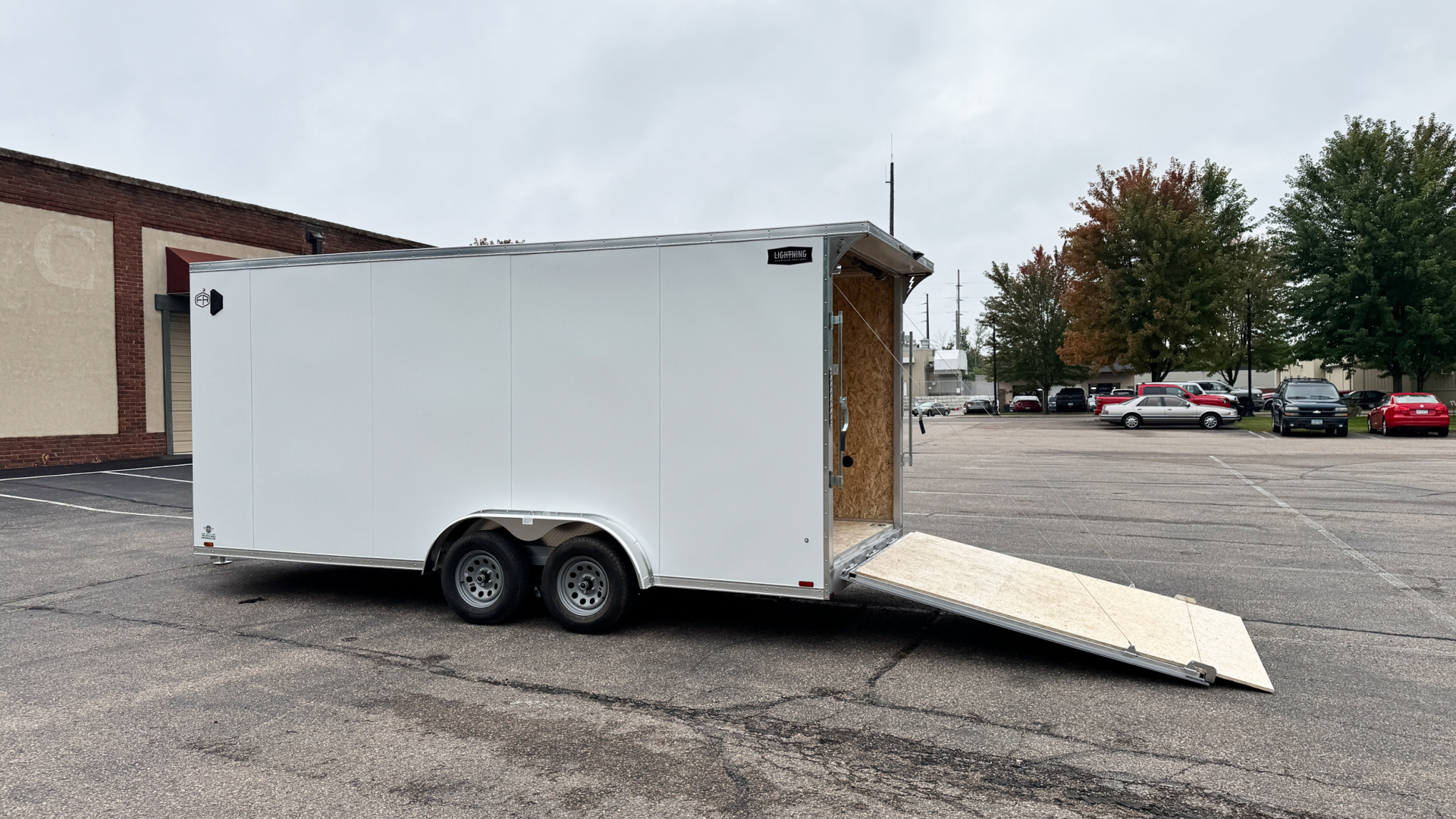 New 2025 Lightning 7.5X18 ENCLOSED CARGO - Ramp door!
