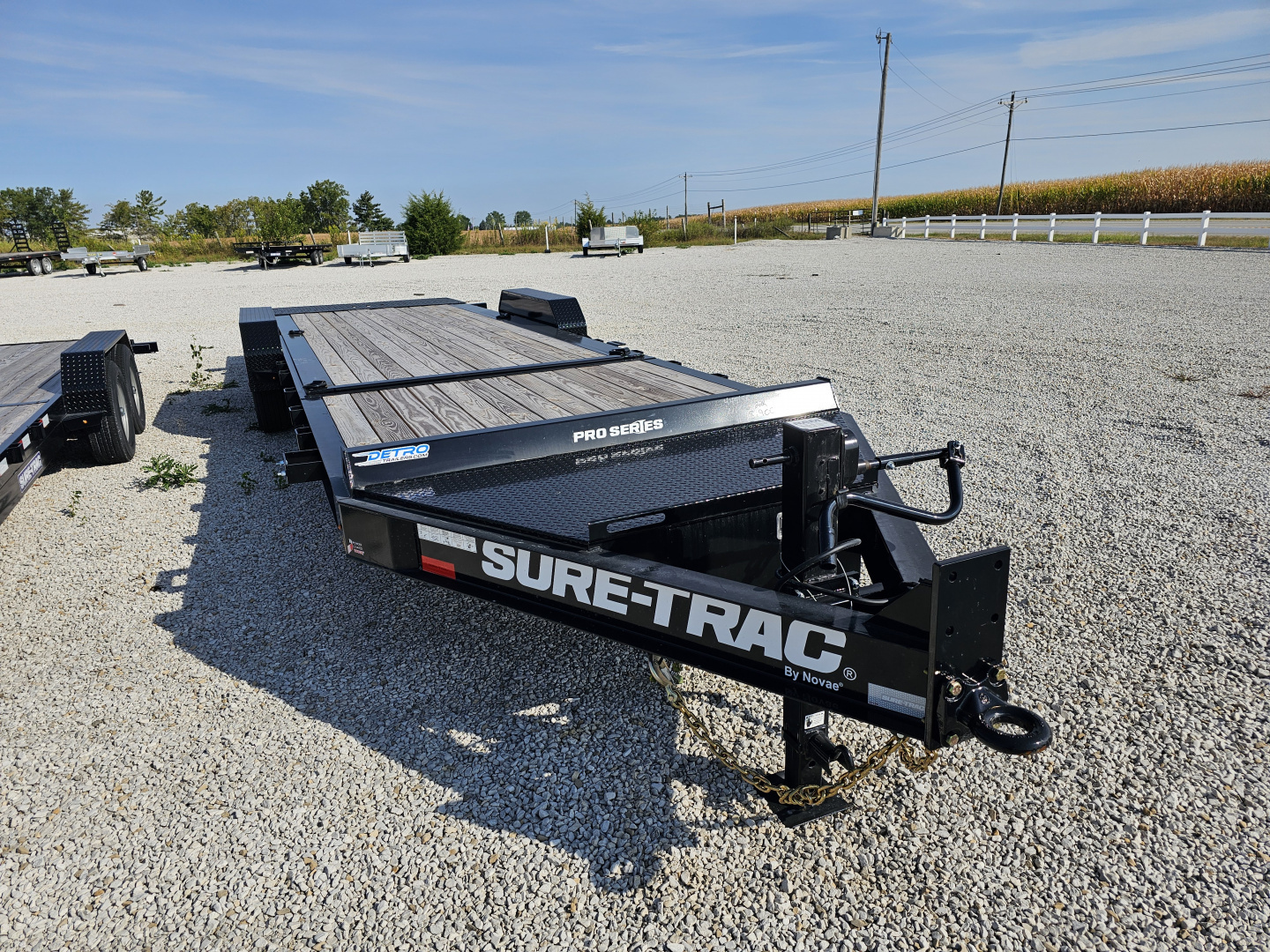 New 2025 Sure-Trac 7 x 24 (18+6) 22K Pro Series Beam Tilt Equipment Trailer