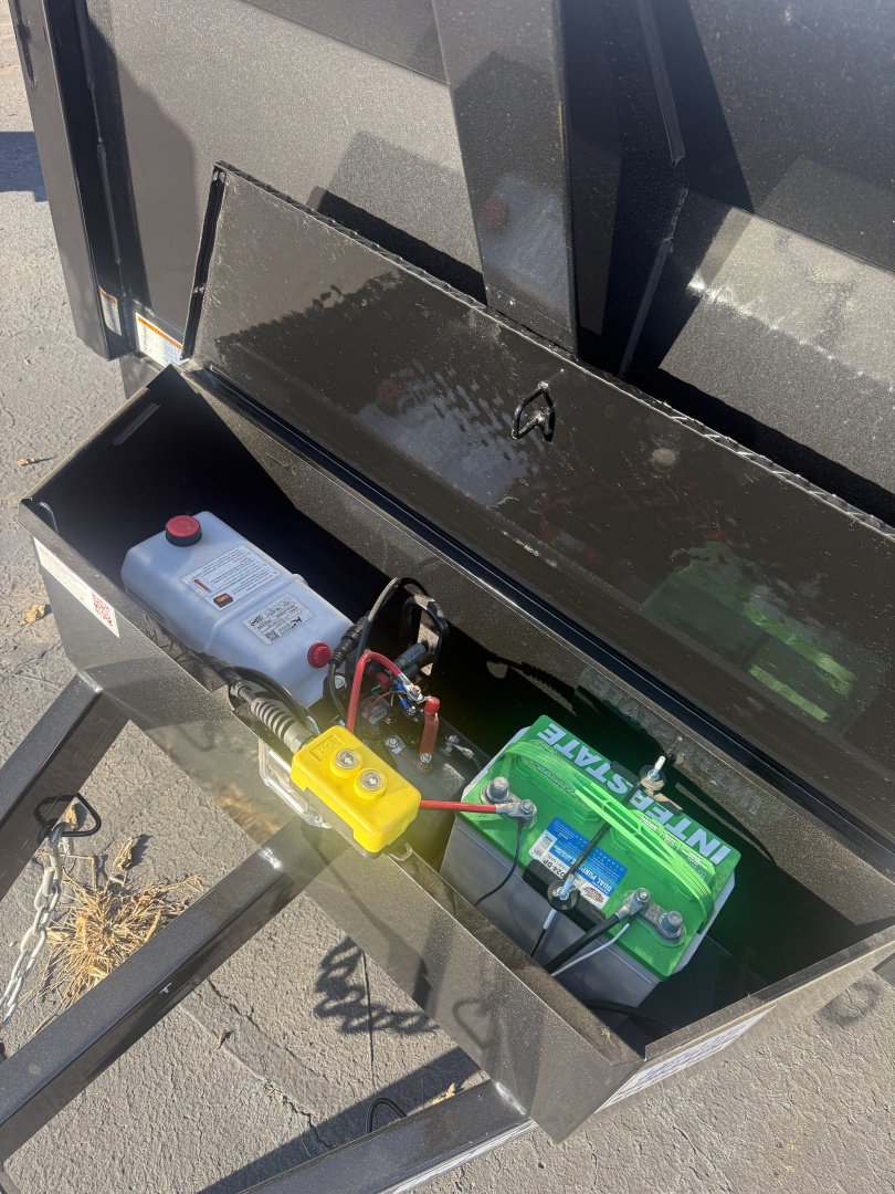 New Sure-Trac 6x10 7k low profile dump , single ram with ramps