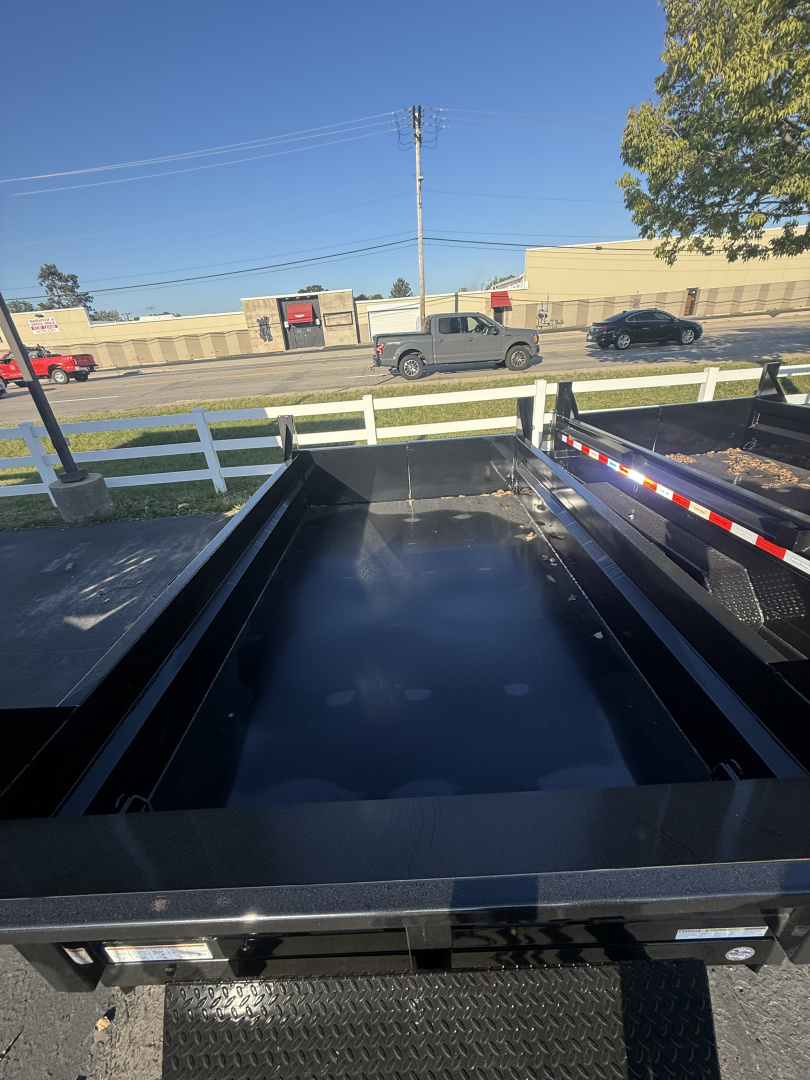 New Sure-Trac 6x10 7k low profile dump , single ram with ramps