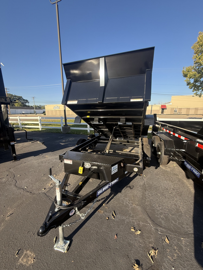 New Sure-Trac 6x10 7k low profile dump , single ram with ramps