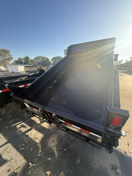 New Sure-Trac 6x10 7k low profile dump , single ram with ramps