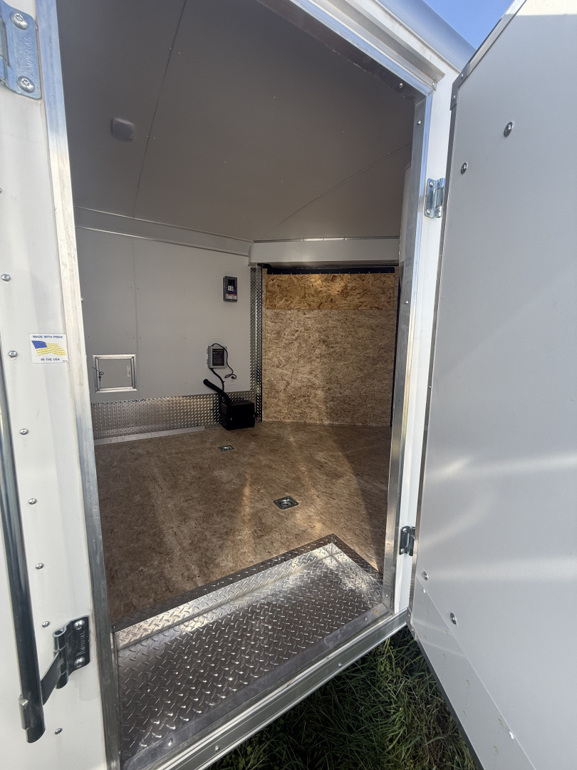 New 2025 MTI Trailers 8.5x25 10k snow/car hauler,torsion axles with alum. Wheels,5' wedge nose,30 amp sevice with cord,12 volt battery,4' caninet,2 windows an fuel doors, round top Car / Racing Trailer