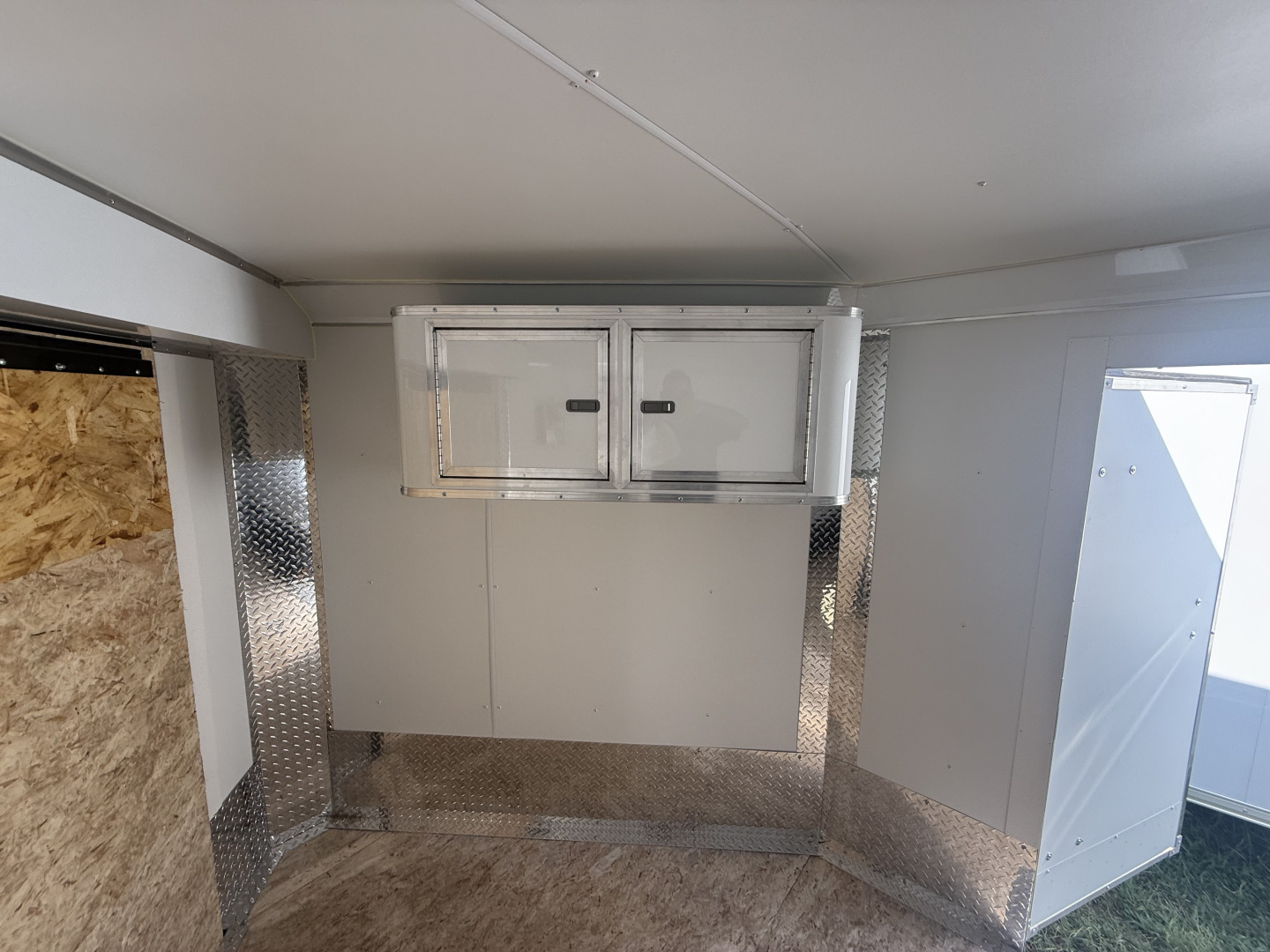 New 2025 MTI Trailers 8.5x25 10k snow/car hauler,torsion axles with alum. Wheels,5' wedge nose,30 amp sevice with cord,12 volt battery,4' caninet,2 windows an fuel doors, round top Car / Racing Trailer