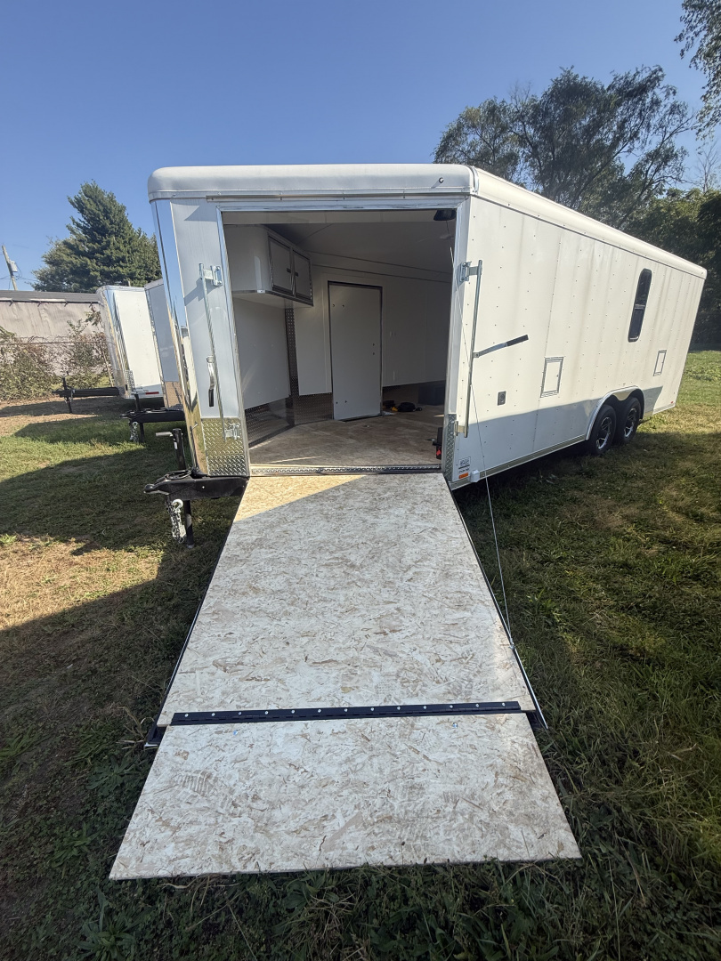 New 2025 MTI Trailers 8.5x25 10k snow/car hauler,torsion axles with alum. Wheels,5' wedge nose,30 amp sevice with cord,12 volt battery,4' caninet,2 windows an fuel doors, round top Car / Racing Trailer